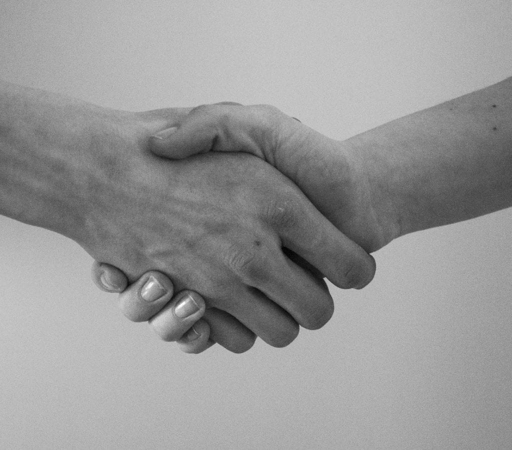 handshake photo in black and white