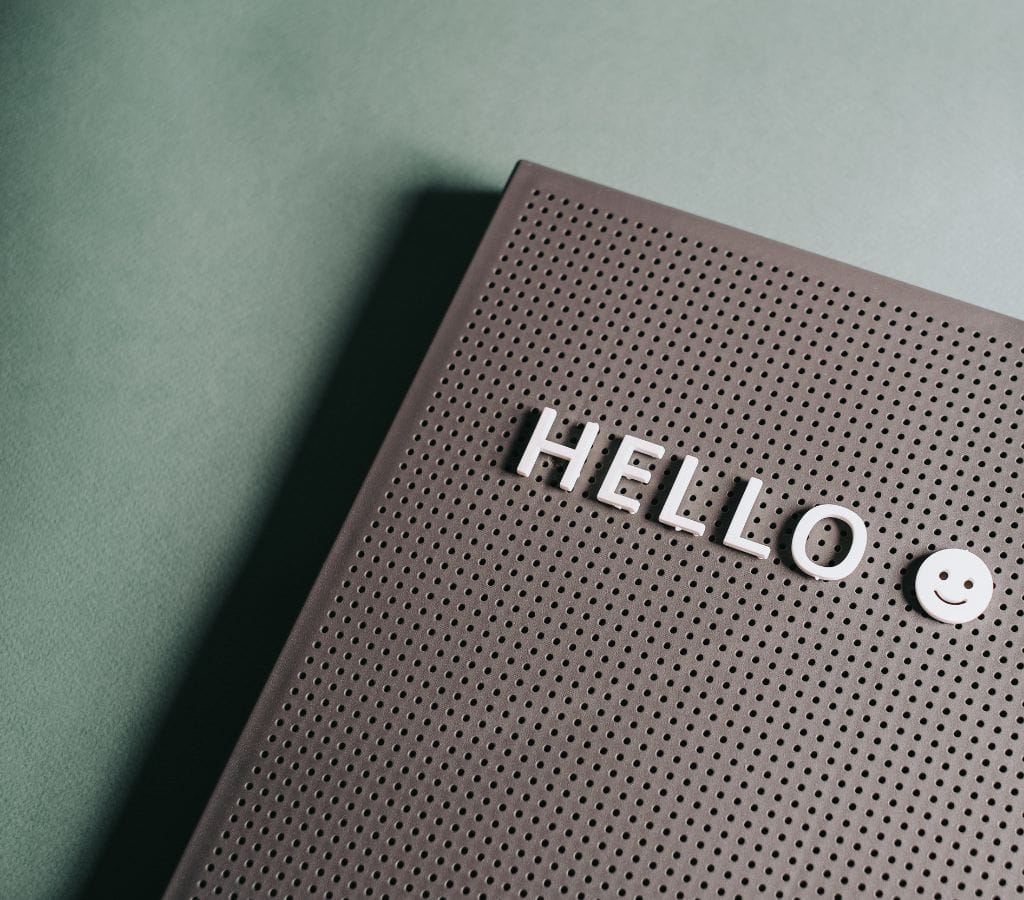 Hello Greeting on Brown Board