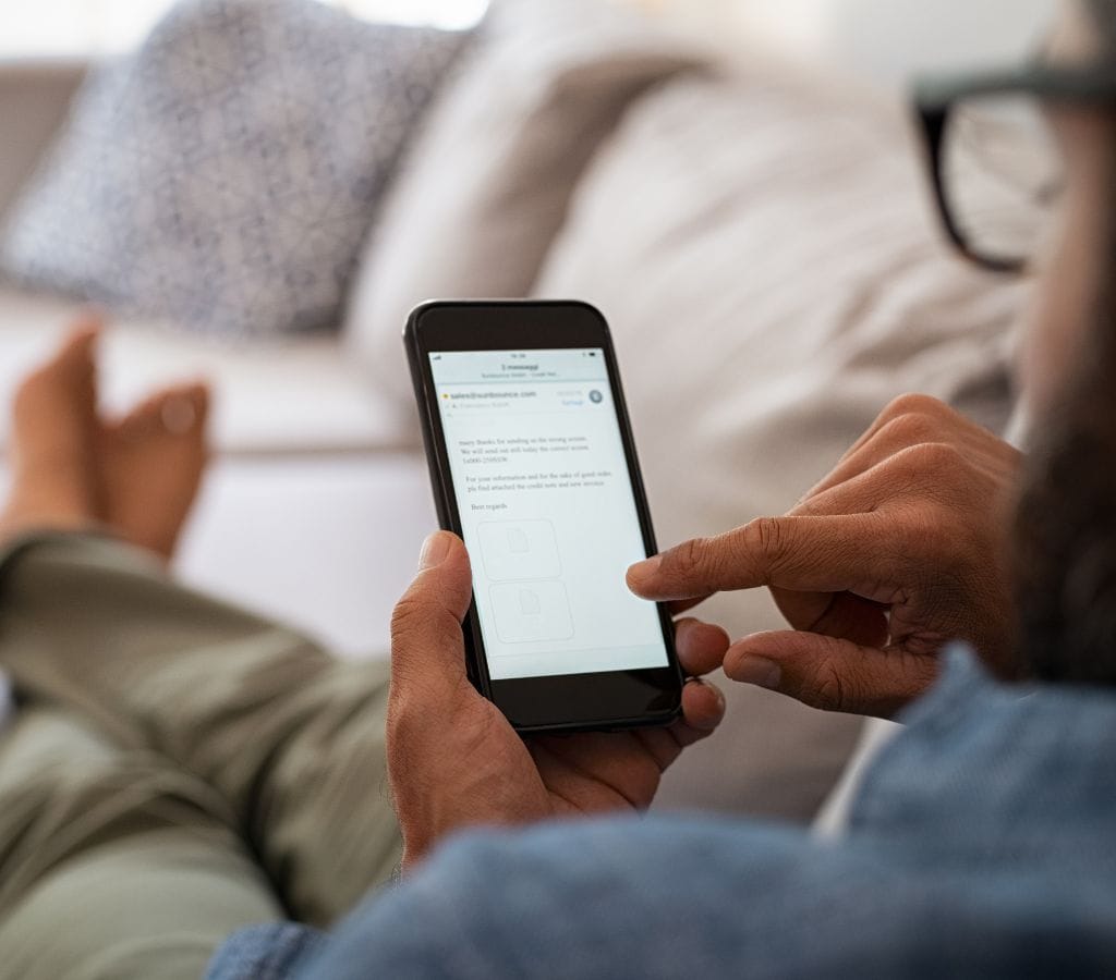 Man Reading Email on Smartphone