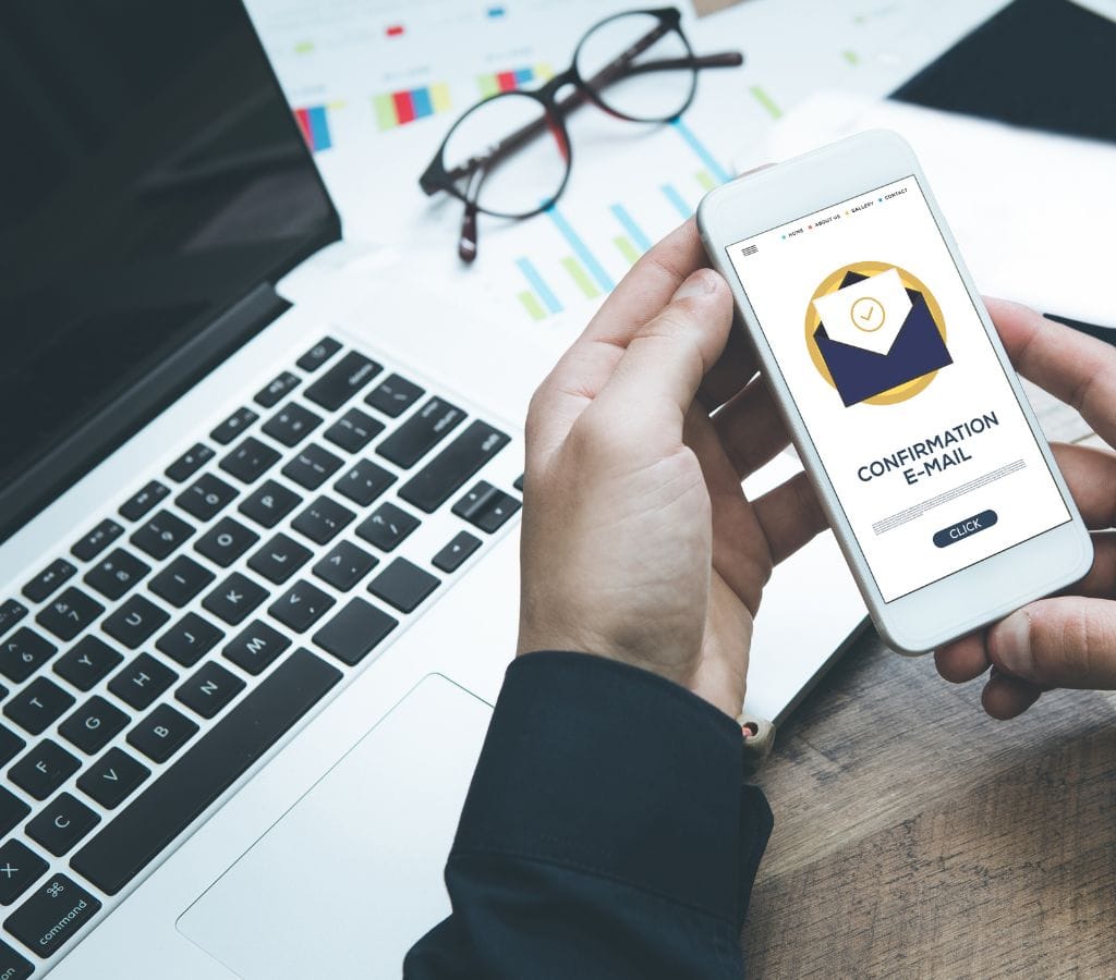confirmation email on mobile phone concept