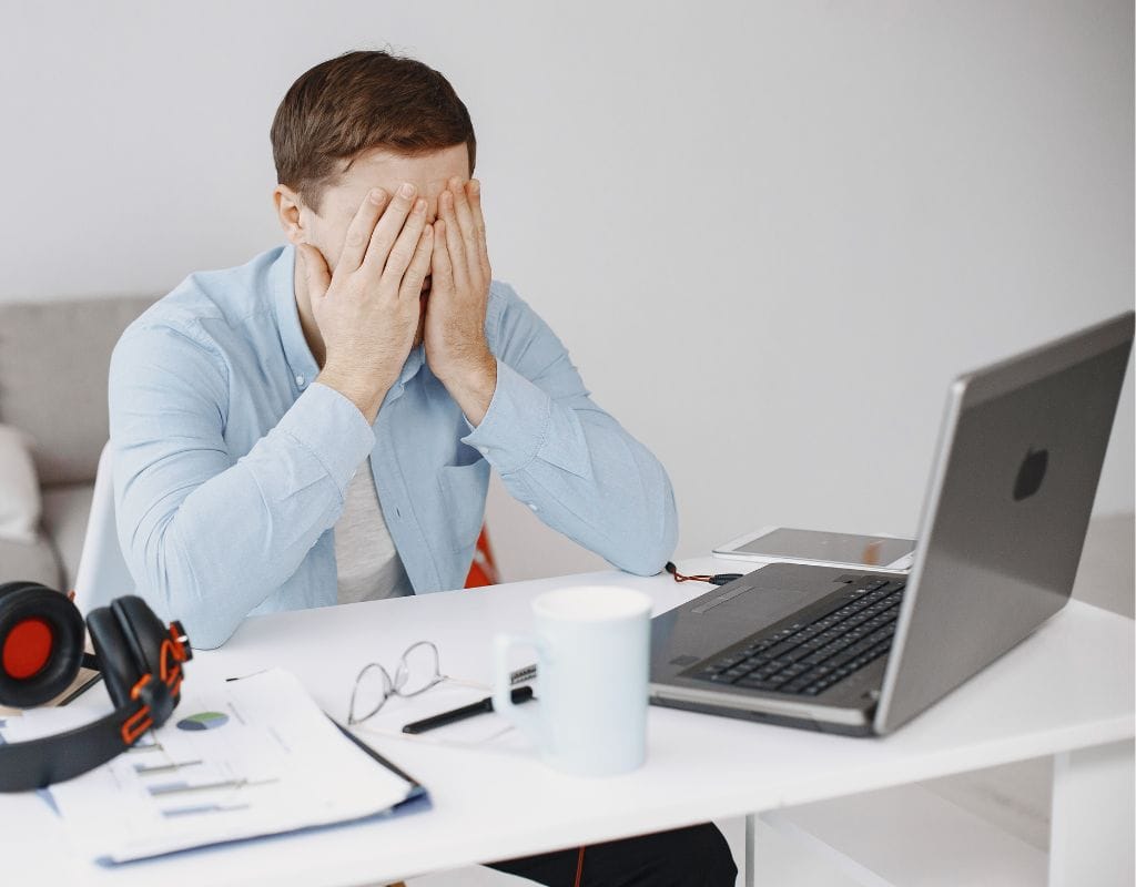 a man being stressed at work